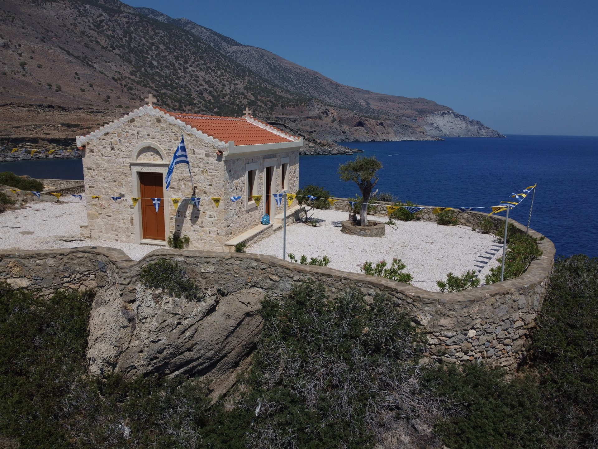Stone chapel above the South Cretan coast near walking routes from Cavo Ponta